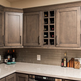 Design ideas for a mid-sized transitional u-shaped kitchen pantry in San Diego with an undermount sink, shaker cabinets, distressed cabinets, quartz benchtops, grey splashback, subway tile splashback, stainless steel appliances and light hardwood floors.