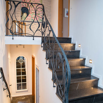 Treppengeländer aus Schmiedeeisen. Stilrichtung Modern. Einfamilien Haus Hennef.