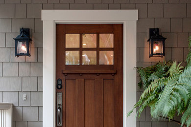 Inspiration for a large craftsman beige wood exterior home remodel in Santa Barbara