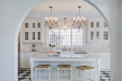 Inspiration for a large timeless ceramic tile and multicolored floor eat-in kitchen remodel in Other with a farmhouse sink, recessed-panel cabinets, white cabinets, quartzite countertops, multicolored backsplash, marble backsplash, stainless steel appliances, an island and beige countertops