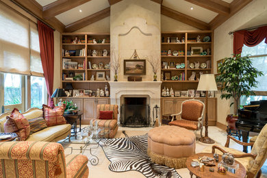 Living room - large traditional formal limestone floor and white floor living room idea in Other with beige walls and a stone fireplace