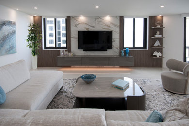 Living room - large contemporary open concept porcelain tile, gray floor and wood wall living room idea in Miami with white walls and a media wall