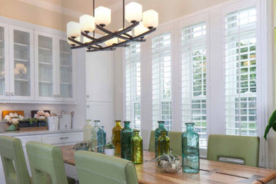 Example of a transitional dining room design in Dallas