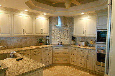 Design ideas for a traditional kitchen in Miami with stainless steel appliances.