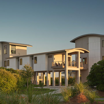 Contemporary Figure Eight Island Custom Home with Curved Rooflines