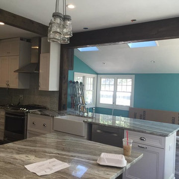 Omega Loring Full Access Transom Cabinetry with Fantasy Brown Quartzite Counters
