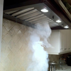 Range Hood insert showing smoke suction power - Range Hoods And Vents