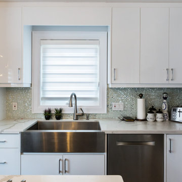 Modern high gloss kitchen with two tone cabinets (black island)