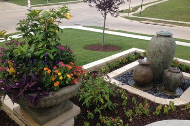 Small traditional garden in Omaha with a container garden.
