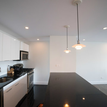 Encapsulation of popcorn ceiling and lighting upgrade in Roosevelt Island, NY