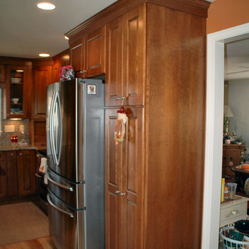 Traditional toffee kitchen remodel with multi-color mosaic tile back-splash