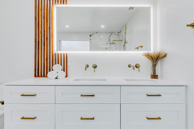 Example of a mid-sized transitional master multicolored tile and porcelain tile porcelain tile, multicolored floor, double-sink and wall paneling bathroom design in Miami with shaker cabinets, white cabinets, a one-piece toilet, gray walls, an undermount sink, quartz countertops and white countertops