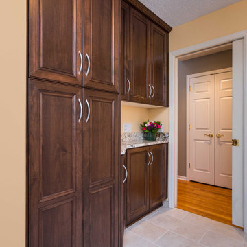 Transitional Style Laundry/Mudroom With Medium Stained Maple Cabinets