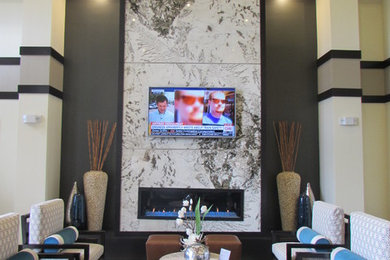 Family room - large contemporary carpeted family room idea in Orlando with white walls