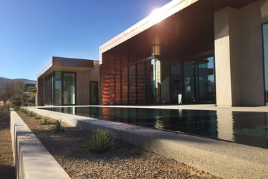 Large minimalist multicolored two-story mixed siding flat roof photo in Las Vegas