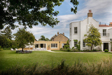 Traditional detached house in London with four floors.
