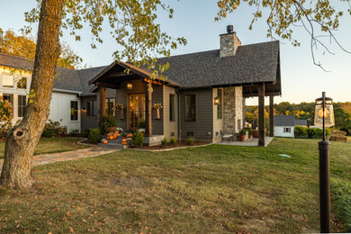 Example of a farmhouse home design design in Other