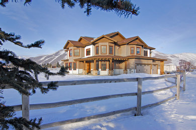 Inspiration for a rustic two-story exterior home remodel in Salt Lake City