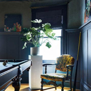 Dark Grey Pool Table Room with Wainscot, Wallpaper, and Vintage Family Furniture