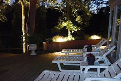 Design ideas for a mid-sized brick landscaping in Other.