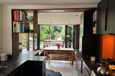 This is an example of a contemporary kitchen in London.