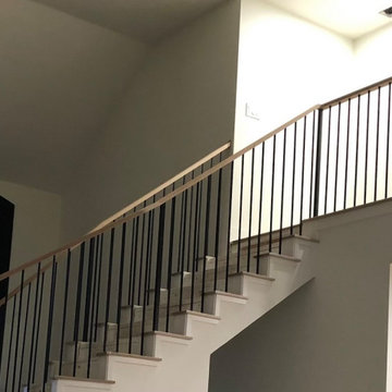 plain bar with iron newel post