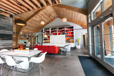 Living room library - huge contemporary open concept concrete floor living room library idea in Baltimore with no fireplace and no tv