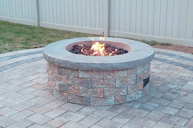 patio round circle addition with a Nicolock serefina round fire pit