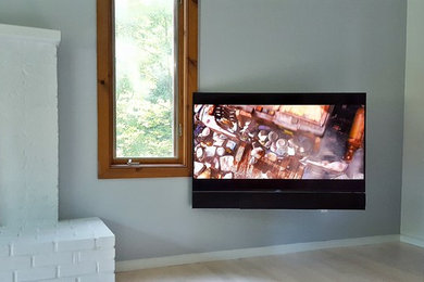 Family room TV with remotely located equipment