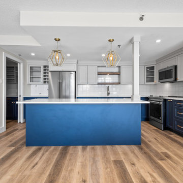 Condo renovation with eye catching blue cabinets