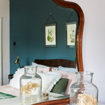 Vintage finds, family antiques and organic textures define this forever home