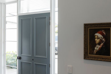 Inspiration for a transitional entryway remodel in Auckland