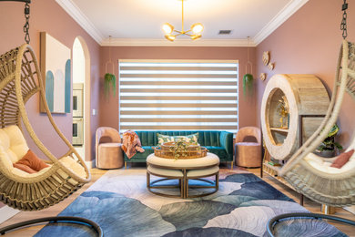 Living room - mid-sized transitional formal medium tone wood floor living room idea in Other with pink walls and no tv