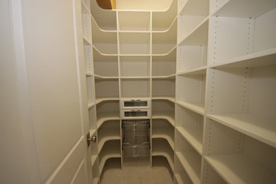 Closet - contemporary closet idea in Miami