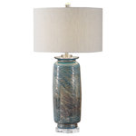 Uttermost - Uttermost Olesya Swirl Glass Table Lamp - This table lamp features a decorative glass base that showcases a unique swirl texture, highlighting shades of ocean blues, greens and metallic bronze. Accenting these vibrant colors are brushed nickel plated details and a thick crystal foot. The round hardback drum shade is a light beige linen fabric with natural slubbing.