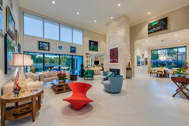 Living room - large contemporary open concept and formal beige floor and porcelain tile living room idea in Other with a standard fireplace, beige walls, a tile fireplace and no tv