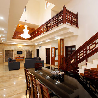 Идея дизайна: гостиная-столовая среднего размера в восточном стиле