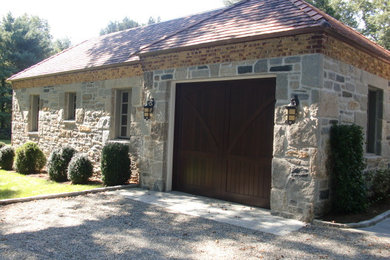 Large elegant beige one-story stone exterior home photo in New York