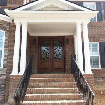 Wood Doors with Wrought Iron