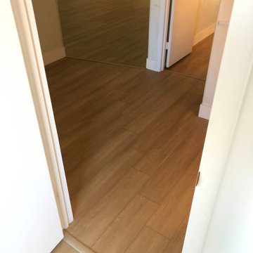 Vinyl Plank & Tile Flooring w/ Baseboards