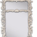 APF Munn Master Framemakers - Bacchus 2 mirror, Bone White - Hand carved frame with clear mirror in two panel format. Finish is antiqued bone white over black clay with a light rub on the surface. Great accent for Modern or Traditional settings. Overall Dimension is 36" x 68". Hangs Vertical only.