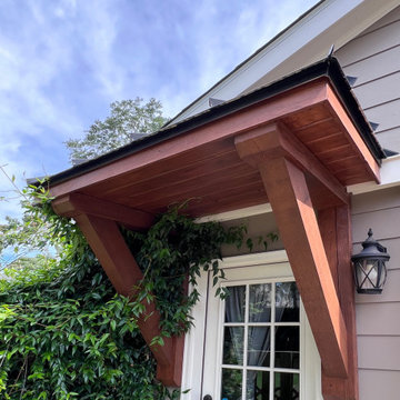 Side door bracket portico