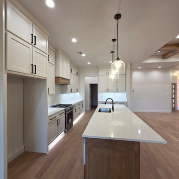Kitchen with quartz countertops and oil rubbed bronze hardware