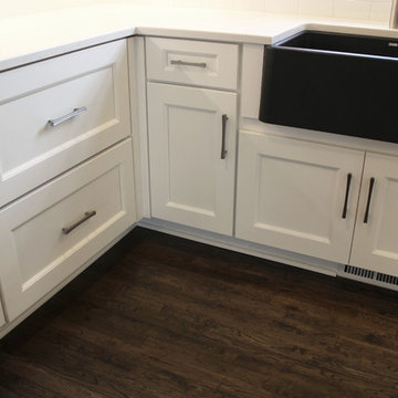 White Kitchen with Gray and Black Quartz Countertop and Bar Area ~ Streetsboro