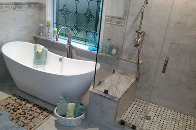 Example of a mid-sized transitional master black and white tile and porcelain tile porcelain tile bathroom design in Other with gray cabinets, a two-piece toilet, white walls, an undermount sink and granite countertops
