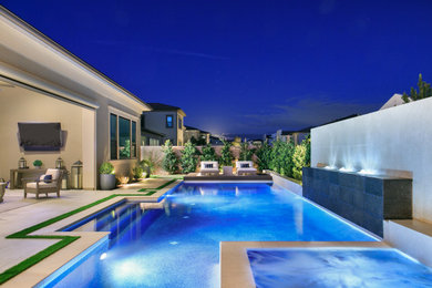 Pool landscaping - mid-sized contemporary backyard custom-shaped pool landscaping idea in San Diego