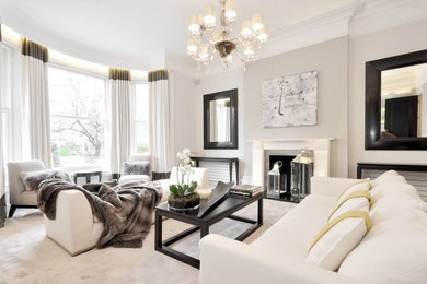 Design ideas for a large contemporary formal open plan living room in London with grey walls, carpet and a standard fireplace.