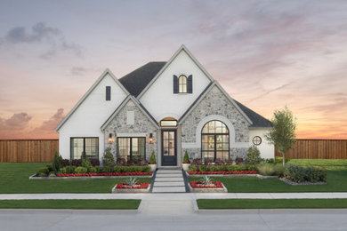 Inspiration for a white one-story mixed siding house exterior remodel in Dallas with a gray roof