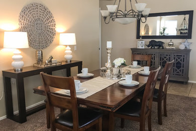 Mid-sized trendy ceramic tile and brown floor enclosed dining room photo in Phoenix with brown walls and no fireplace