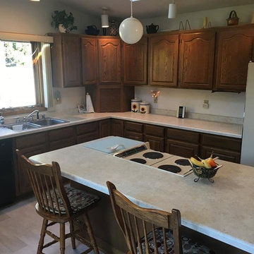 Kitchen Transformation Done with New Laminate Countertop and Flooring